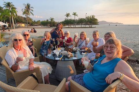 Members of Solent Events & Leisure/On Tour relaxing on the beach in Borneo