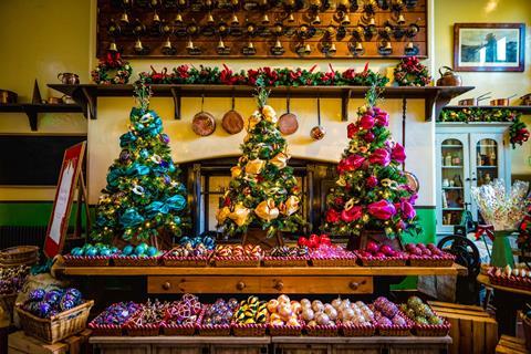 A range of christmas decorations laid out in a shop