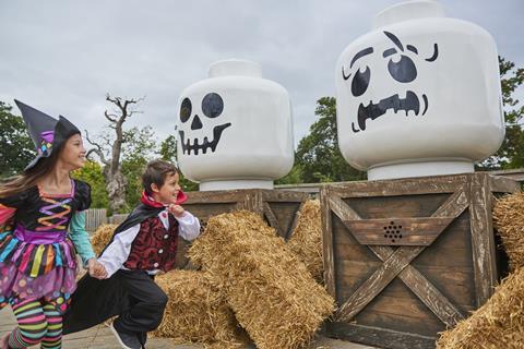Children explore spooky displays as part of Legoland's Brick or Treat event