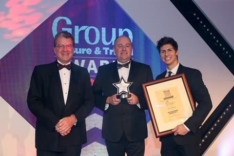 Glen Thomas (centre) collecting The Excellence Award at the Group Leisure & Travel Awards 2017.