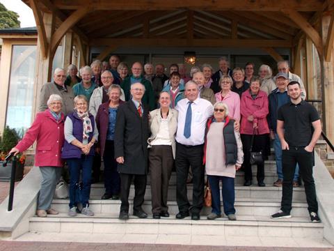 Mike Potts group outside a hotel in Bolton