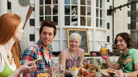 A group enjoying fish and chips in Brighton