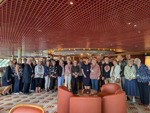 A group of GTOs and Fred. Olsen staff on board Borealis cruise ship.