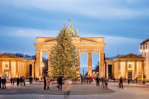 The Brandenburg Gate in Berlin lit up for Christmas.
