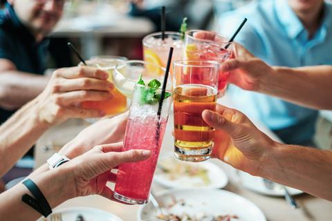 Group drinking beer and cocktails