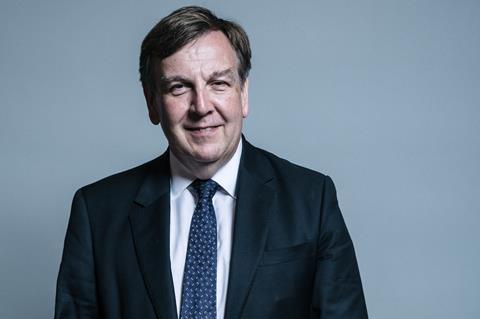 A portrait of the tourism minister Sir John Whittingdale