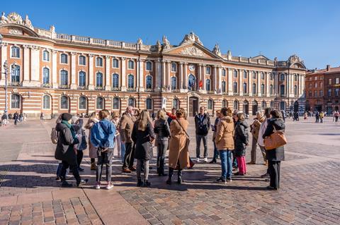 A tour group outside Place du Capitole, Toulouse, France