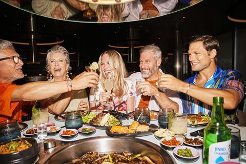 Group dining on a Virgin Voyages cruise.