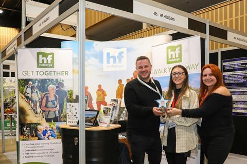 Members of the HF Holidays team at their stand at the Group Leisure & Travel Show 2023