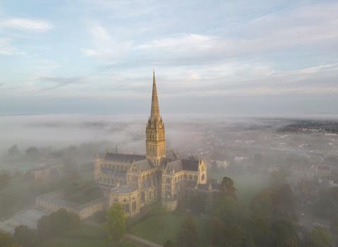 A view of Salisbury Cathedral on a wintry, misty day