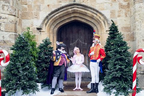 Three characters from the Nutcracker pose outside Leeds Castle for their Christmas promotion