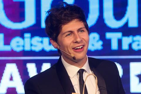 Ben Hanlin performing at the Group Leisure & Travel Awards 2017