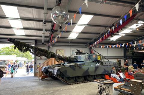 Military tank in warehouse