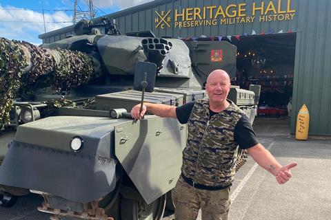 Man stood with military tank at Eden Camp