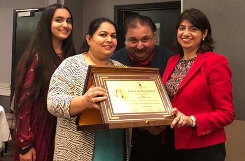 GTO Balwinder Kaur with her family and her community award