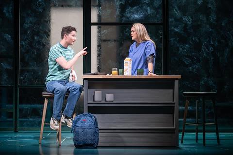 Evan Hansen and his mother as Evan prepares to go to school.