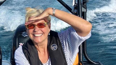 Julie Peasgood sailing on Odyssey