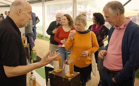 Visitors to the Living Crafts festival at Hatfield Park in Hertfordshire sample some of the drink on offer