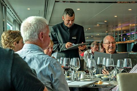 A group dine on board a Scenic cruise ship