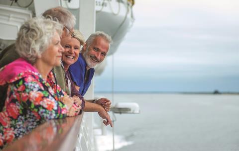 A group of people on board a Fred. Olsen Cruise Lines ship
