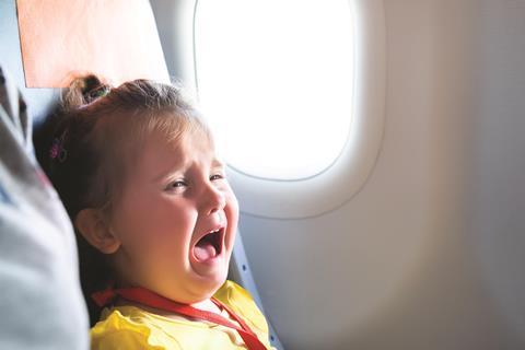 Crying child on a plane