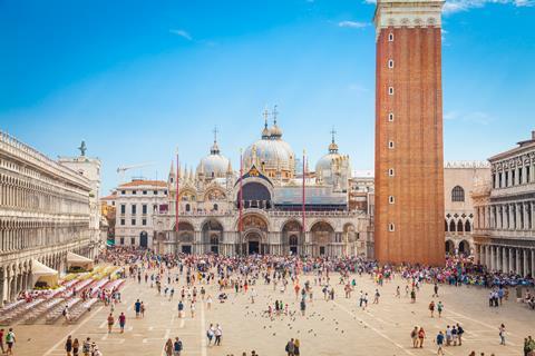 Piazza San Marco with the Basilica of Saint Mark and the bell tower of St Mark's Campanile in Venice, Italy.
