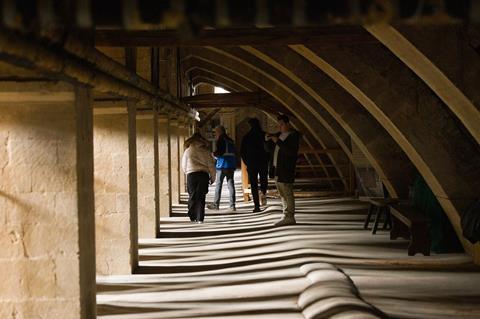 A group on a guided tour in the Cathedral eaves