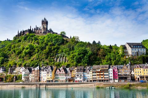 A picturesque view of Cochem in Germany with Reichsburg Castle up on the hill