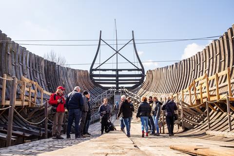 A group touring the Tourville Historic Shipyard, Dunkirk
