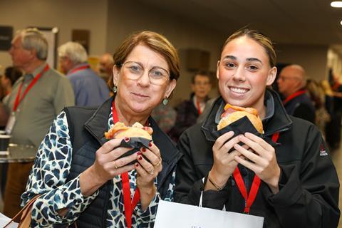 Guests enjoying a bacon butty at the 2023 GLT Show