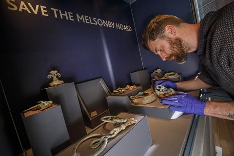 Dr Adam Parker installing the Melsonby Hoard in the Yorkshire Museum